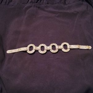 Bracelet, faux silver leather w/faux silver metal and sparkle accents. Adjustabl